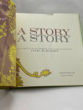 Load image into Gallery viewer, A Story, A Story An African Tale Gail E. Haley ISBN 0689205112
